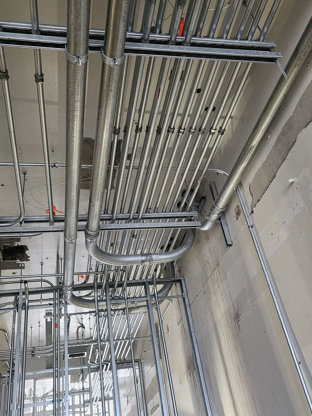 Overhead conduit runs in a commercial building